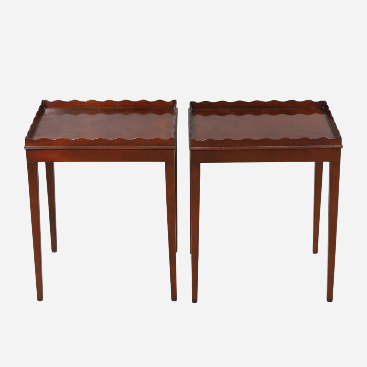 a_pair_of_mahogany_scallo_0.webp A Pair of Mahogany Scalloped Tables